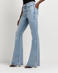 River Island BLUE MID RISE FLARED JEANS | womens Responsibly Sourced Cotton denim flares
