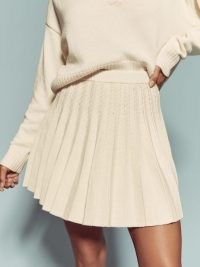 Reformation Mattia Cotton Knit Mini Skirt in Gossamer | pleated short length skirts | womens knitted fashion | women’s on-trend knitwear