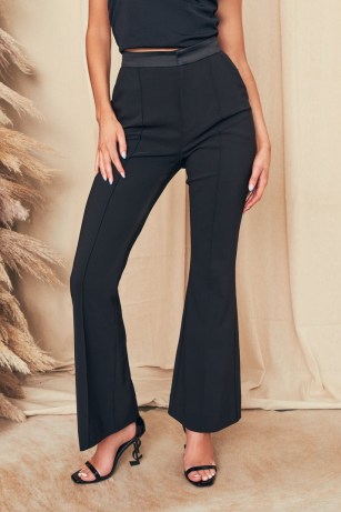 lavish alice satin waistband fit and flare trousers in black ~ womens tailored going out evening flares - flipped