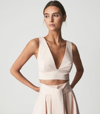 Reiss TAMMI NEUTRAL CROP TOP WITH BOW DETAIL | deep V-neck cropped hem event tops | plunging neckline | occasion fashion - flipped