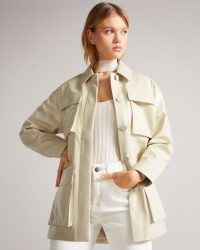 Ted Baker FOZIEY Textured Vinyl Field Jacket in Ivory | womens retro belted jackets