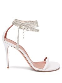 AMINA MUADDI Georgia crystal-strap white leather sandals | ankle wraparound barely there high heels with crystals | luxury party footwear