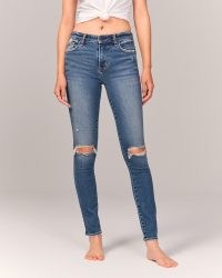 Abercrombie & Fitch Mid Rise Super Skinny Jeans in Ripped Medium Wash | womens blue denim knee rip distressed skinnies