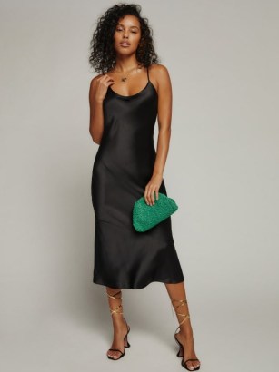 Reformation Alisal Dress in Black | slinky LBD | glamorous evening look | fluid fabric slip dresses - flipped