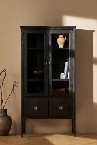 Amber Lewis for Anthropologie Curio Cabinet in Black ~ chic rustic pine wood furniture ~ stylish glass door and concealed storage cabimets
