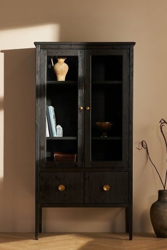 Amber Lewis for Anthropologie Curio Cabinet in Black ~ chic rustic pine wood furniture ~ stylish glass door and concealed storage cabimets - flipped