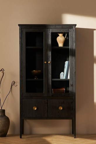Amber Lewis for Anthropologie Curio Cabinet in Black ~ chic rustic pine wood furniture ~ stylish glass door and concealed storage cabimets