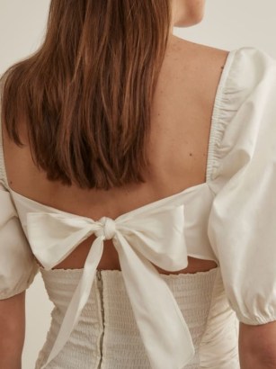 REFORMATION Barry Top in White ~ back tie detail fashion ~ puff sleeve ruched bodice tops ~ women’s organic cotton clothing - flipped