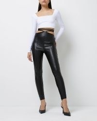 River Island BLACK FAUX LEATHER STRAP SKINNY TROUSERS – women’s strappy tie waist skinnies