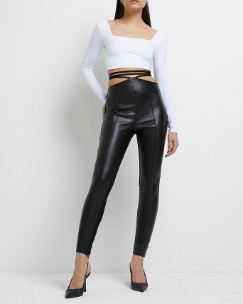 River Island BLACK FAUX LEATHER STRAP SKINNY TROUSERS – women’s strappy tie waist skinnies - flipped
