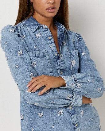 River Island BLUE FLORAL EMBROIDERED DENIM SHIRT | women’s puff sleeved shirts | long sleeve blouse with flower embroidery - flipped
