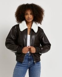 River Island BROWN FAUX LEATHER SHEARLING BOMBER JACKET – women’s on-trend jackets – cool casual looks