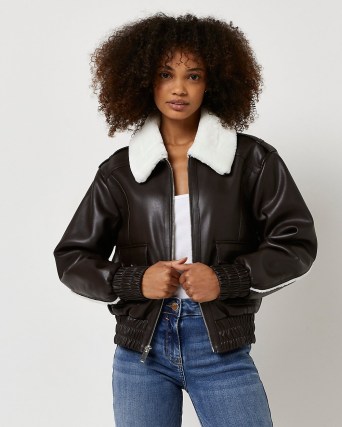 River Island BROWN FAUX LEATHER SHEARLING BOMBER JACKET – women’s on-trend jackets – cool casual looks - flipped