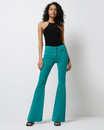 River Island GREEN MID RISE FLARED JEANS – women’s denim flares - flipped