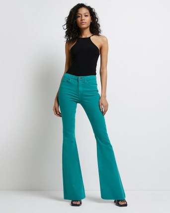 River Island GREEN MID RISE FLARED JEANS – women’s denim flares