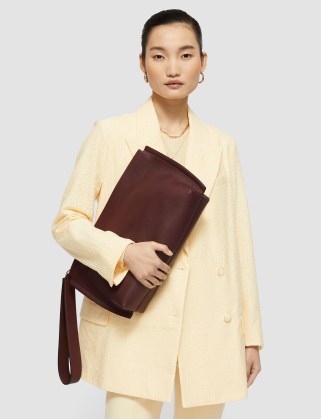 Joseph Leather Clutch Bag in Grape | large wrist strap bags | luxe minimalist handbags
