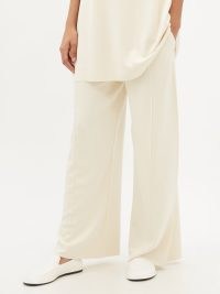 THE ROW Gretel wide-leg trousers / women’s ivory fluid knitted silk pants / womens designer fashion / minimalist clothing