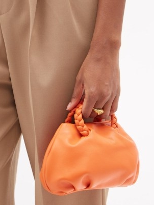 HEREU Bombon orange leather braided top handle cross-body bag | small luxe crossbody bags