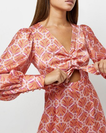 RIVER ISLAND ORANGE PRINTED PLAYSUIT / tie front cut out detail playsuits - flipped