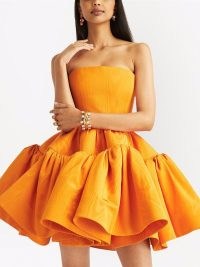 Oscar de la Renta cold-shoulder flared mini dress in amber orange | bright strapless flared tiered hem party dresses | womens designer occasion fashion | fit and flare event clothing