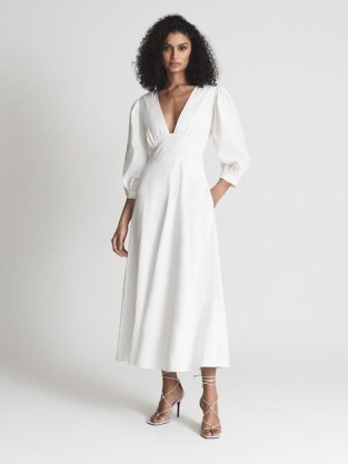 Reiss CHRISTIE Puff Sleeve Plunge Midi Dress White | plunging neckline occasion dresses | deep V-neck fit and flare event fashion - flipped