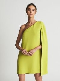 REISS SAMANTHA Cape One Shoulder Mini Dress in Lime – bright chic retro style occasion dresses – glamorous vintage inspired cocktail fashion – women’s evening event glamour