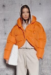 MISSGUIDED re_styld orange curved hem puffer coat – womens bright padded jackets – women’s trending fashion