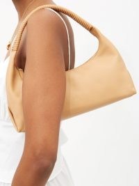 KHAITE Remi small leather shoulder bag ~ luxe baguette style handbags ~ luxury oblong bags