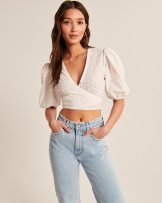 Abercrombie & Fitch Wrap-Front Eyelet Puff Sleeve Top / white short sleeved crop tops / cropped hem blouses