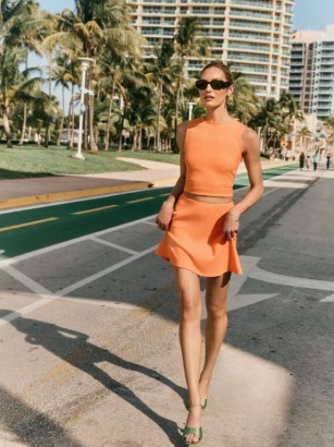 Reformation Andres Two Piece in Tangerine | orange rib knit sleeveless top and mini skirt fashion set | women’s on-trend clothes | womens bright tops and skirts | clothing co-ords - flipped
