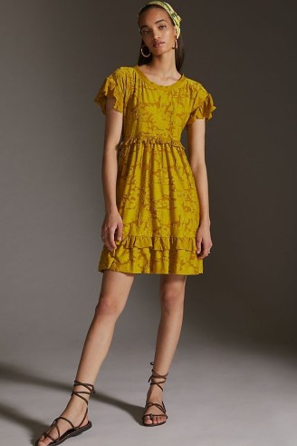 Anthropologie Ruffle Knit Mini Dress in Chartreuse / floral ruffle trim dresses / open tie back clothing / women’s cut out detail fashion