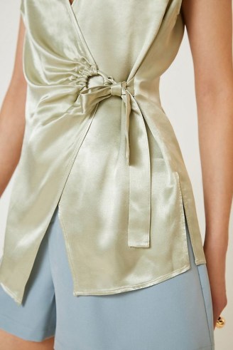 ANTHROPOLOGIE Iridescent Wrap Vest Mint ~ sleeveless green satin look tops ~ women’s asymmetric tie waist vests