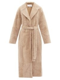 RAEY Wrap-around beige shearling coat | women’s luxe longline belted tie waist coats