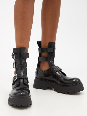 ALEXANDER MCQUEEN Cutout buckled leather ankle boots / women’s black chunky cut out footwear / biker inspired fashion