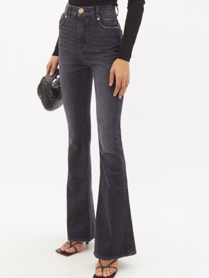 BALMAIN High-rise bootcut jeans | women’s faded black denim fashion | casual designer clothing - flipped
