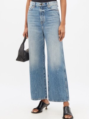 KHAITE Jordan splatter-print flared jeans ~ women’s casual blue denim flares