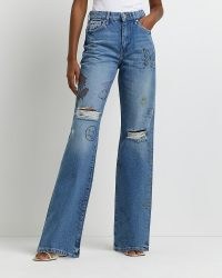 River Island BLUE RIPPED MID RISE STRAIGHT JEANS | doodle graphic print denim fashion