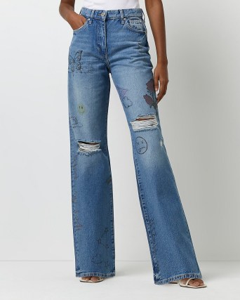 River Island BLUE RIPPED MID RISE STRAIGHT JEANS | doodle graphic print denim fashion - flipped