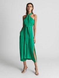 Reiss EVVIE Tie Waist Halterneck Midi Dress Green – halter neck evening dresses with asymmetric hem – women’s occasion clothing with asymmetrical hemline – glamorous event fashion