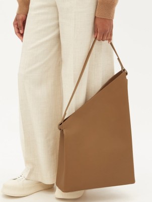 AESTHER EKME Sway asymmetrical leather shoulder bag | contemporary asymmetric bags | minimalist handbags - flipped