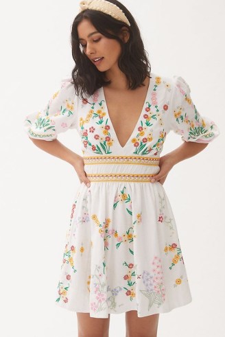 Anthropologie Deep-V Floral Mini Dress in Ivory – embroidered plunge front open tie back dresses – women’s puff sleeved summer clothes