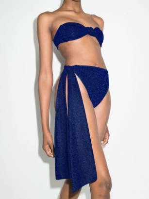 Oséree Lumiére oversized-bow lurex bikini – royal blue metallic thread bikinis – strapless bandeau top – side draped detail bottoms - flipped