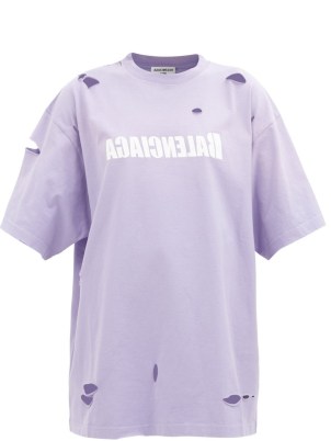 BALENCIAGA Logo-print distressed cotton-jersey T-shirt in lilac ~ women’s short sleeved oversized designer T-shirts ~ womens ripped tee - flipped