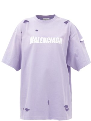 BALENCIAGA Logo-print distressed cotton-jersey T-shirt in lilac ~ women’s short sleeved oversized designer T-shirts ~ womens ripped tee