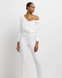 RIVER ISLAND WHITE ONE SHOULDER JUMPSUIT – belted asymmetric neckline jumpsuits – on-trend going out evening fashion