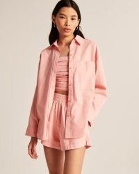 Abercrombie & Fitch Oversized Poplin Button-Up Shirt ~ women’s casual pink curved hem shirts