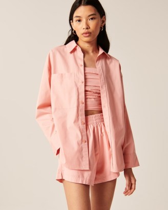 Abercrombie & Fitch Oversized Poplin Button-Up Shirt ~ women’s casual pink curved hem shirts - flipped