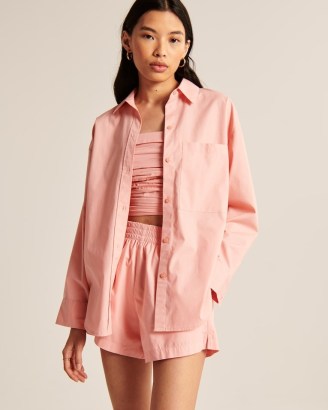 Abercrombie & Fitch Oversized Poplin Button-Up Shirt ~ women’s casual pink curved hem shirts
