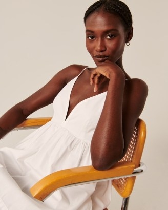 Abercrombie & Fitch V-Neck Babydoll Mini Dress in white | plunge front skinny shoulder strap dresses