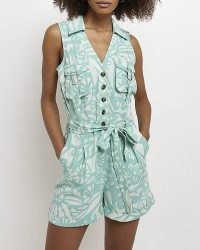 RIVER ISLAND BLUE FLORAL SLEEVELESS PLAYSUIT / belted tie waist utility style playsuits / women’s on-trend summer fashion